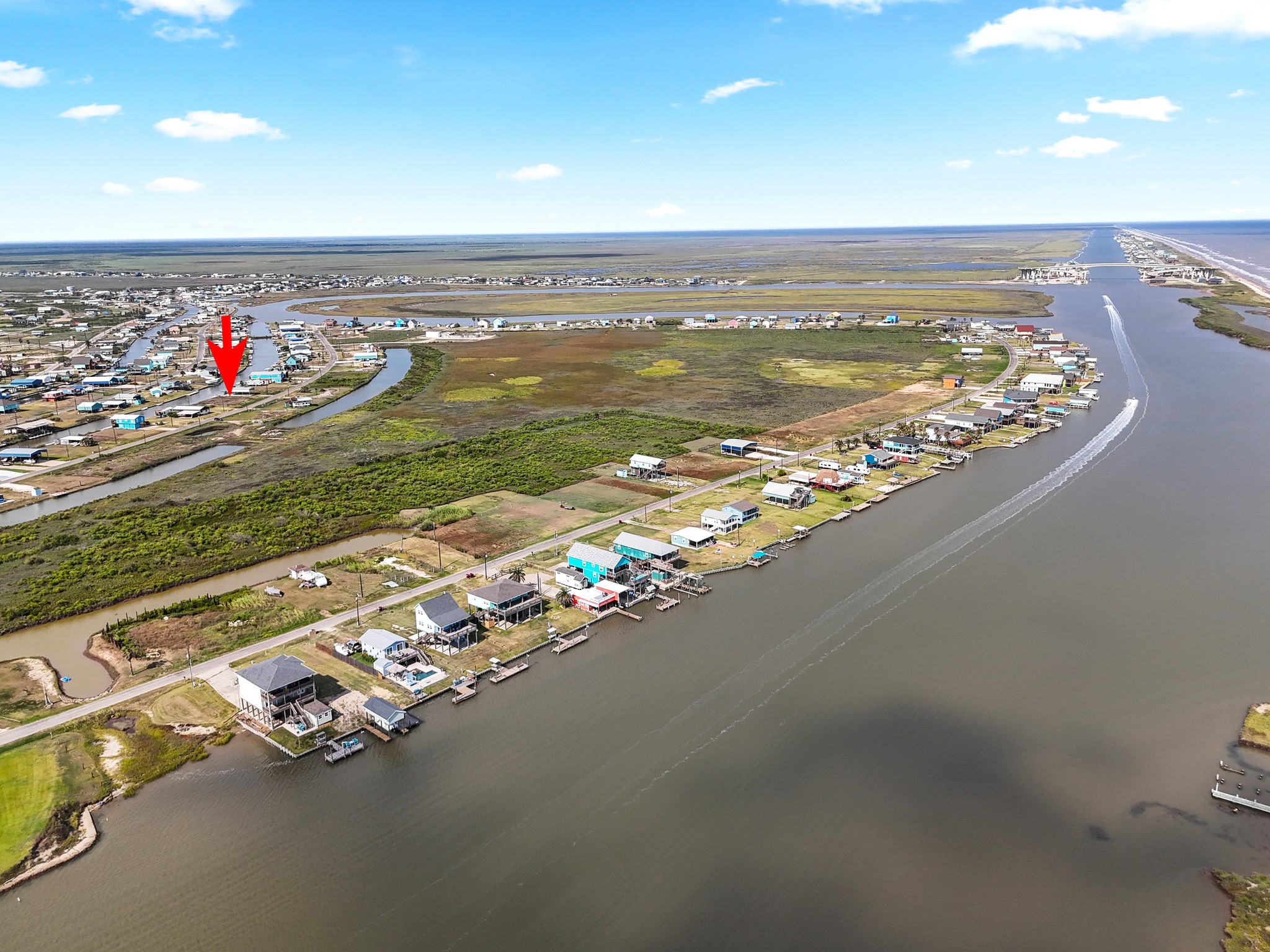 204 Dolphin Way Road Sargent, TX 77414 - Photo 3 of 11 a view of an ocean and beach