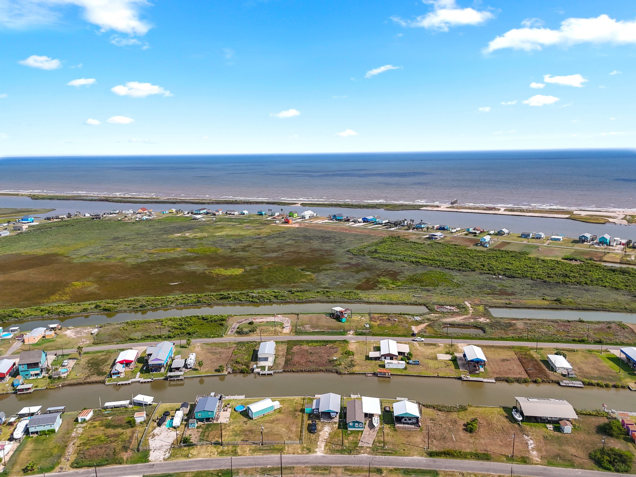 204 Dolphin Way Road Sargent, TX 77414 - Photo 6 of 11 a view of an ocean and beach