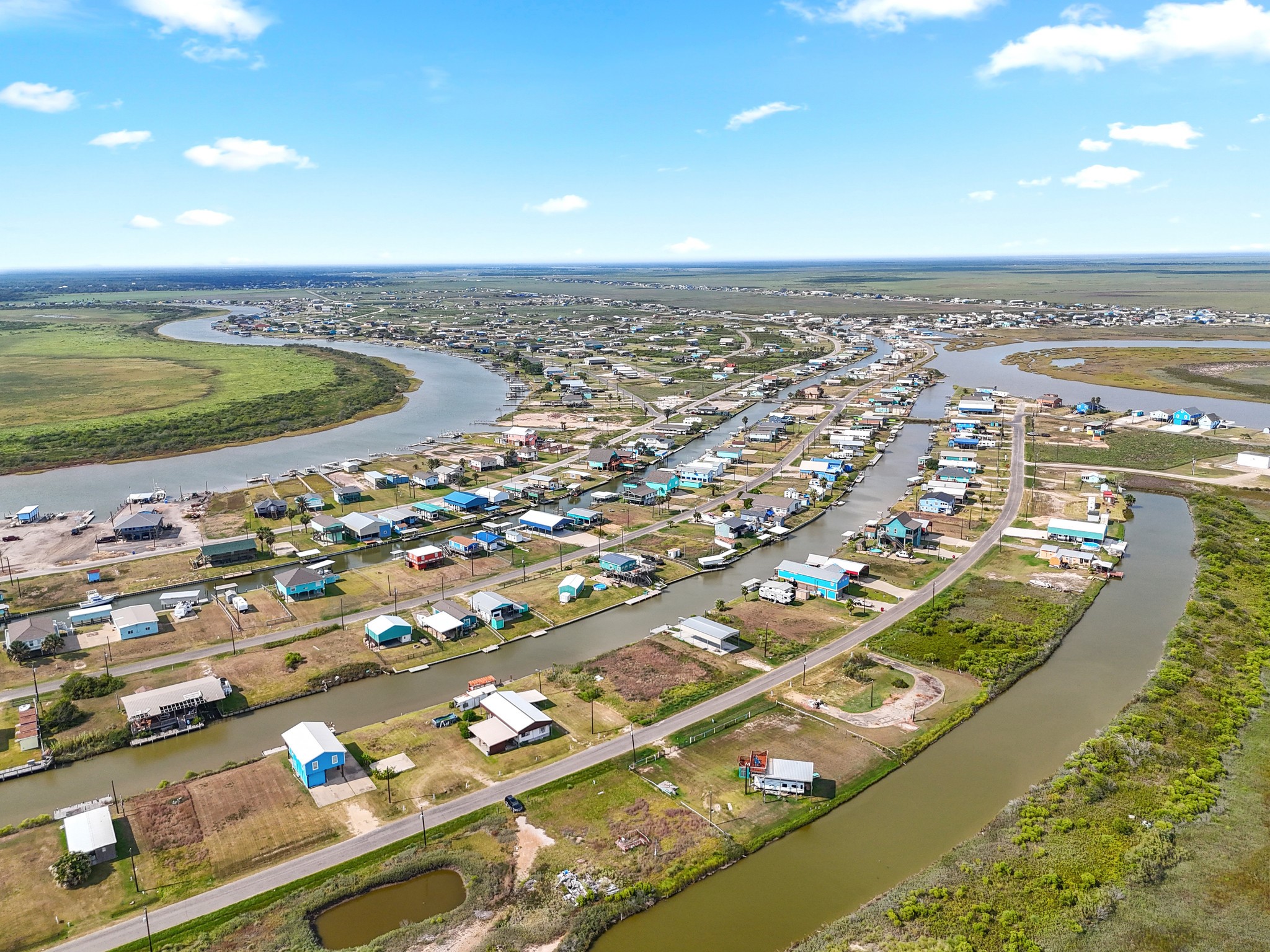 204 Dolphin Way Road Sargent, TX 77414 - Photo 9 of 11 an aerial view of a city