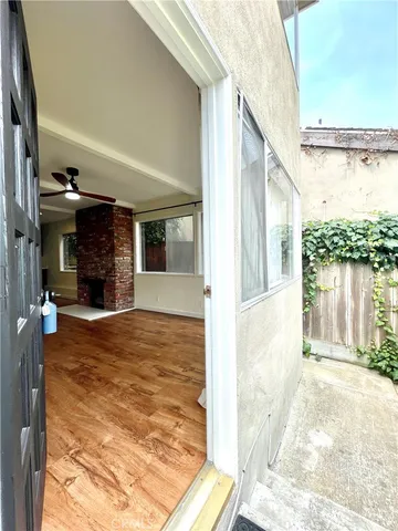 a view of livingroom with furniture and a fireplace