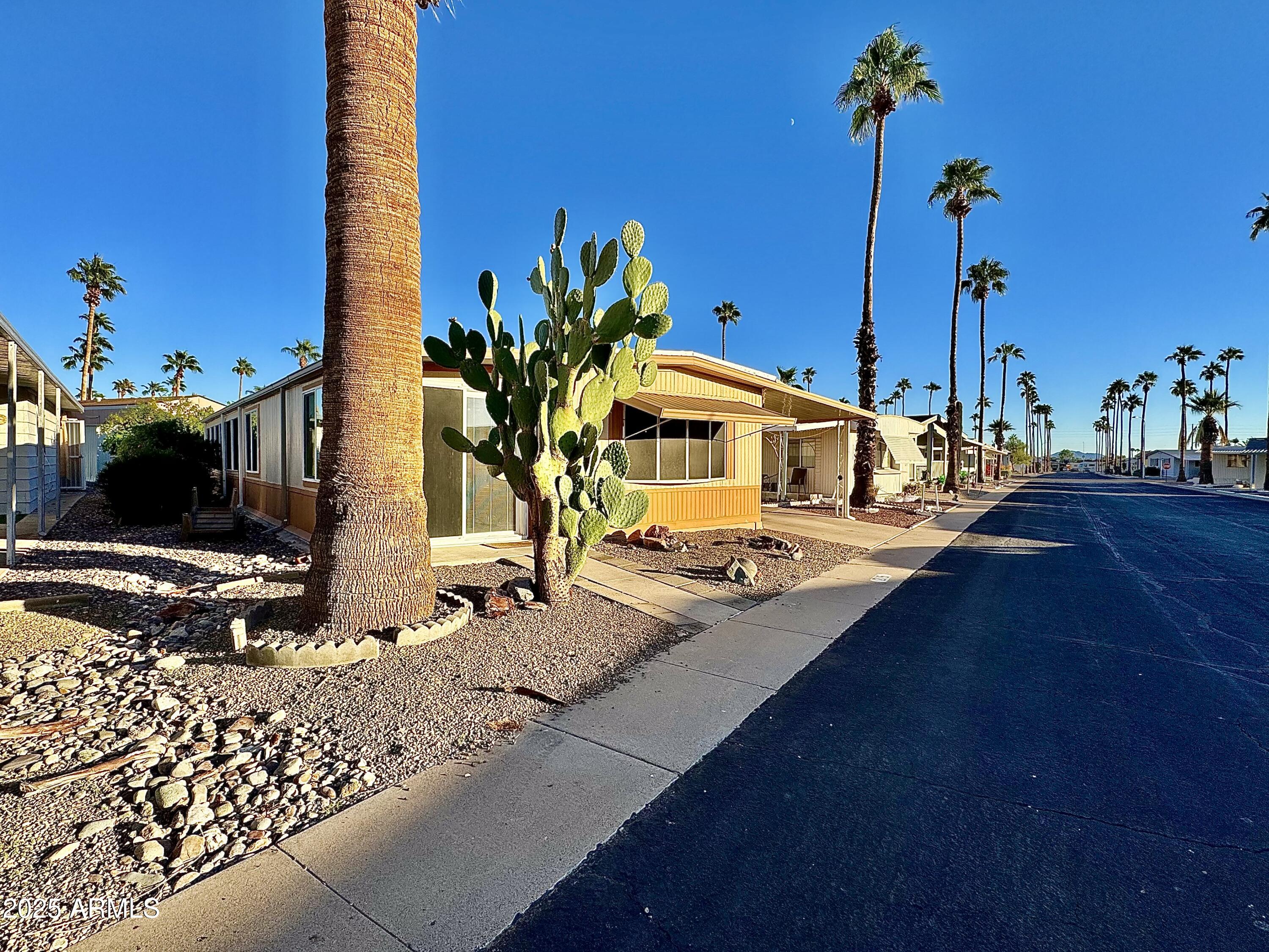 303 South Recker Road, Unit 215 Mesa, AZ 85206 - Photo 2 of 19 a view of a house with outdoor space