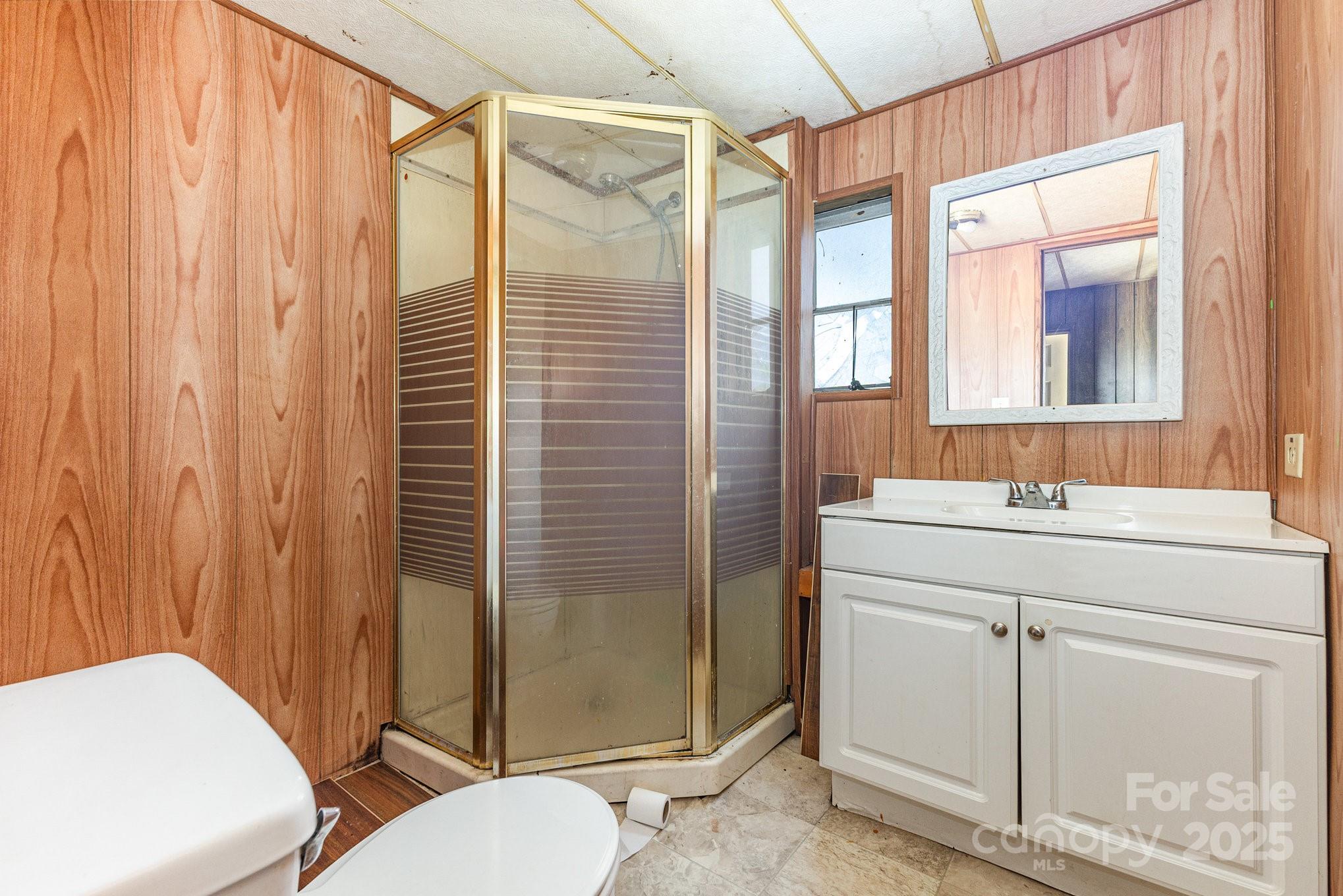 610 Osteen Road York, SC 29745 - Photo 19 of 42 a bathroom with a sink toilet and shower