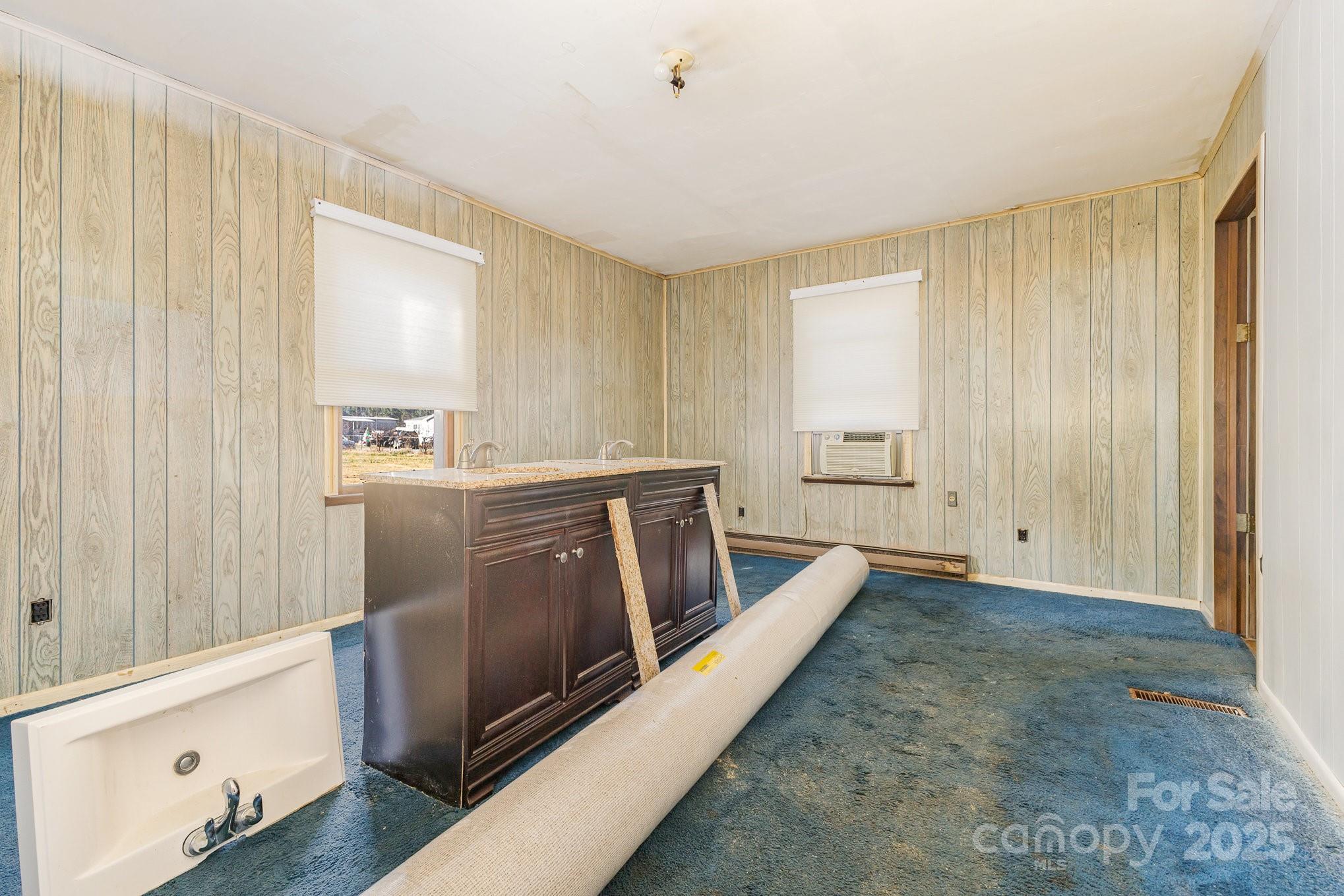 610 Osteen Road York, SC 29745 - Photo 23 of 42 a view of a kitchen with cabinets and wooden floor