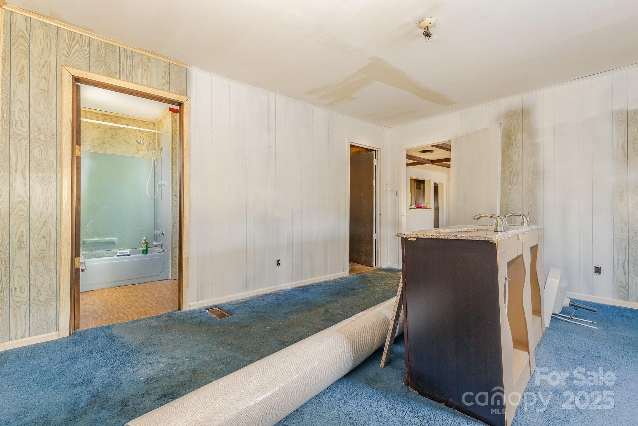 610 Osteen Road York, SC 29745 - Photo 26 of 42 a living room with a couch and a walk in closet