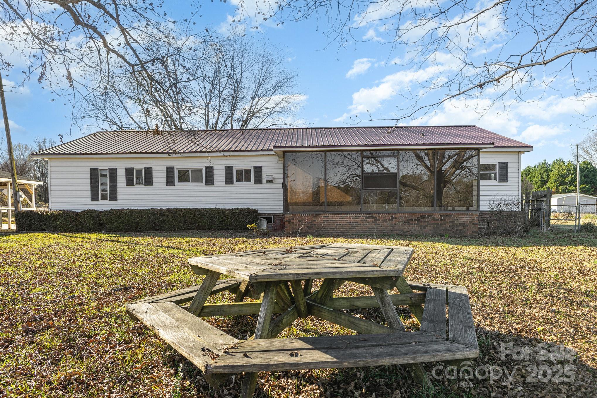 610 Osteen Road York, SC 29745 - Photo 3 of 42 a view of house with backyard space and balcony