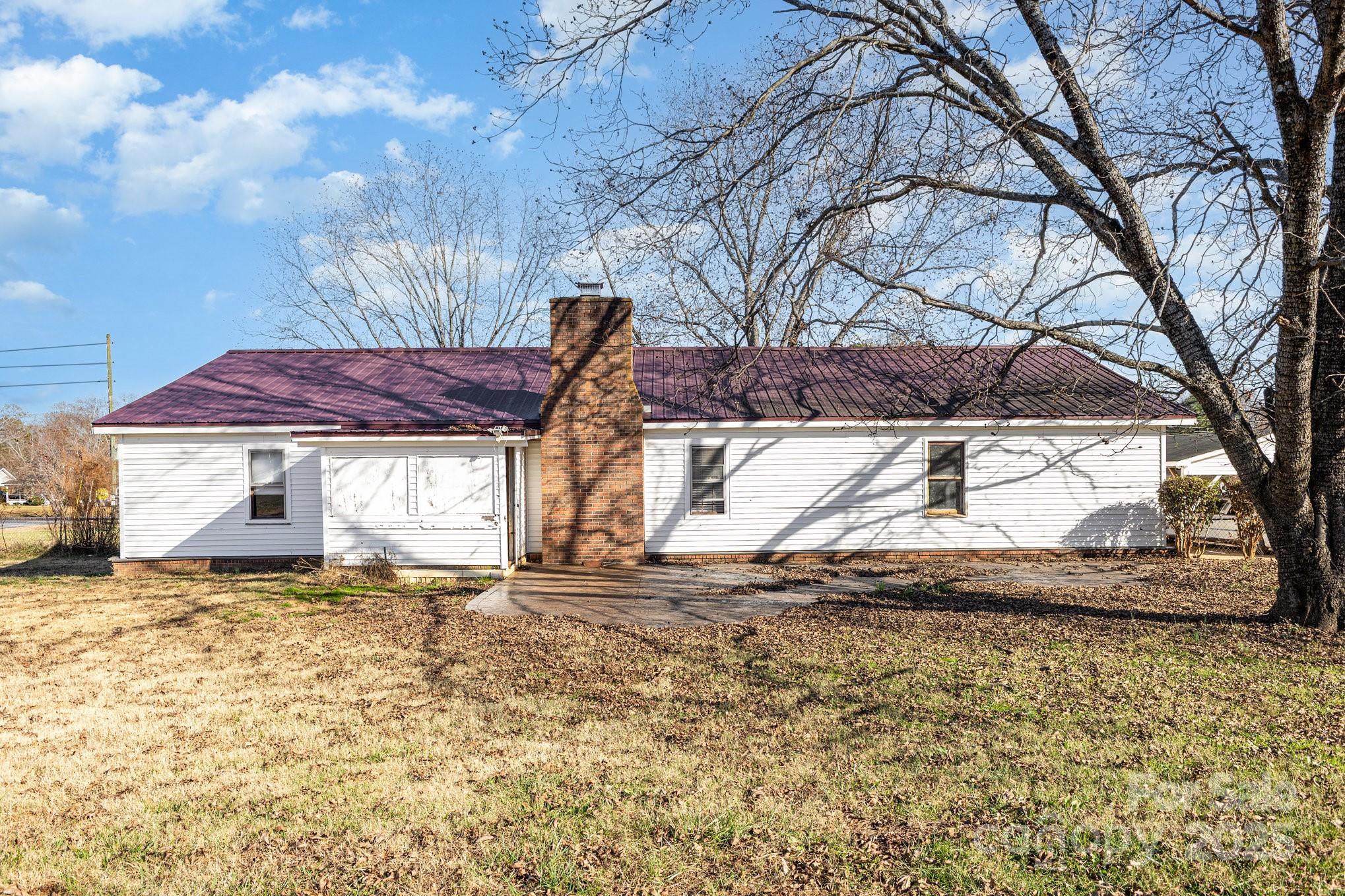 610 Osteen Road York, SC 29745 - Photo 39 of 42 a backyard of a house with table and chairs