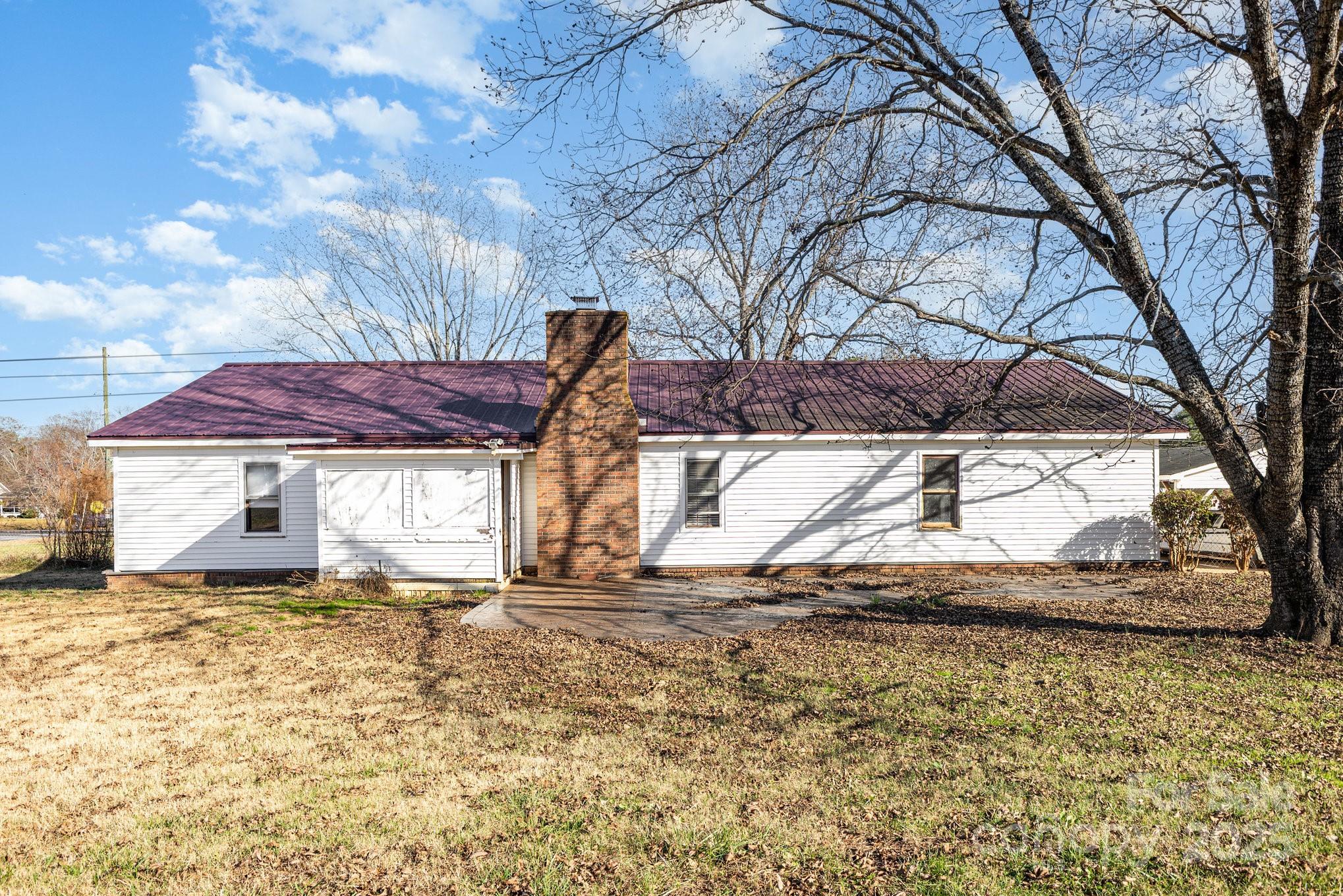 610 Osteen Road York, SC 29745 - Photo 40 of 42 a view of a house with a yard covered with snow