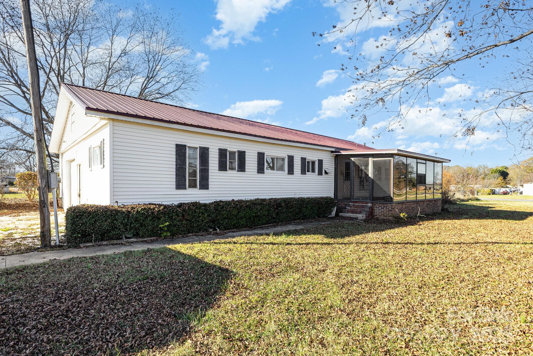 610 Osteen Road York, SC 29745 - Photo 4 of 42 a view of a house with snow on the side of the road