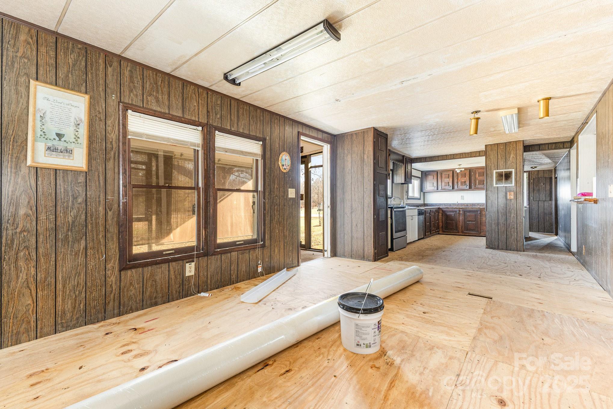 610 Osteen Road York, SC 29745 - Photo 8 of 42 a bedroom with a bed and a large window