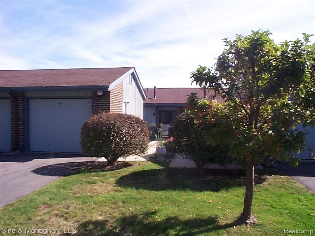 1715 River Road, Unit 24 St. Clair, MI 48079 - Photo 29 of 30 29 BACK 1715 River Rd #24.JPG