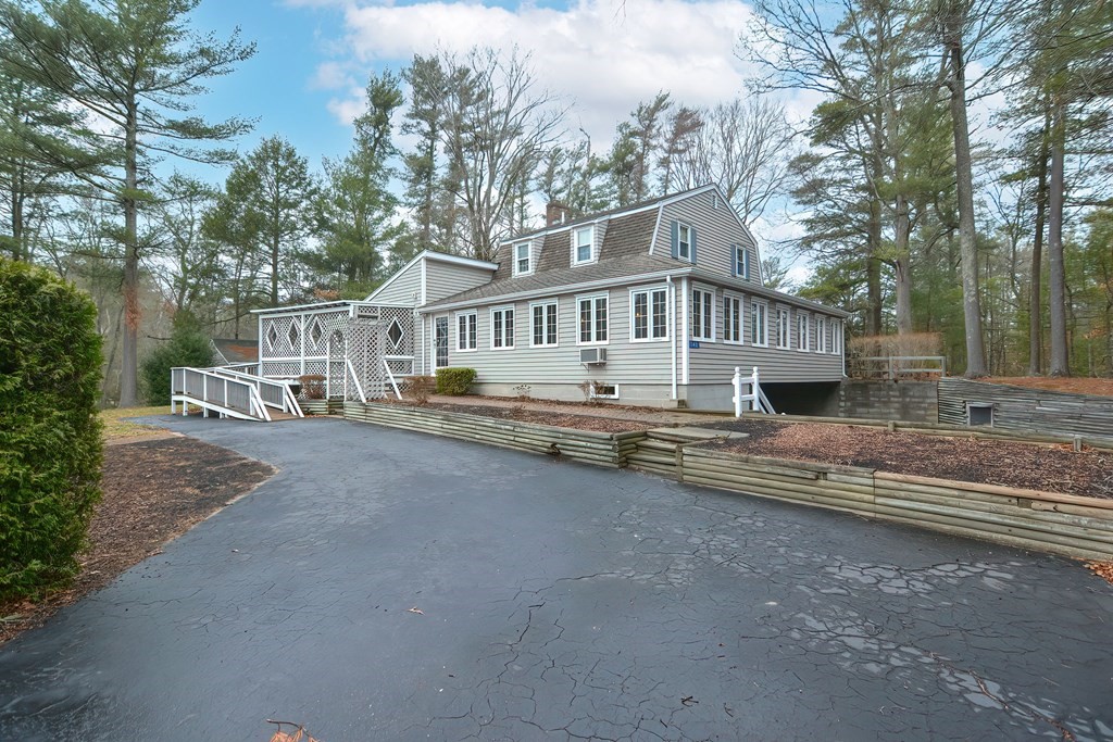 142 Middleboro Road Freetown, MA 02717 - Photo 1 of 42 a front view of a house with a yard and lake view