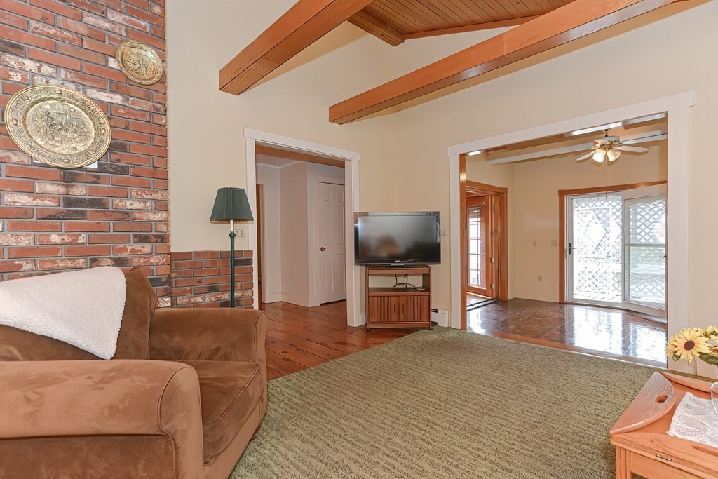 142 Middleboro Road Freetown, MA 02717 - Photo 14 of 42 a living room with furniture and a flat screen tv