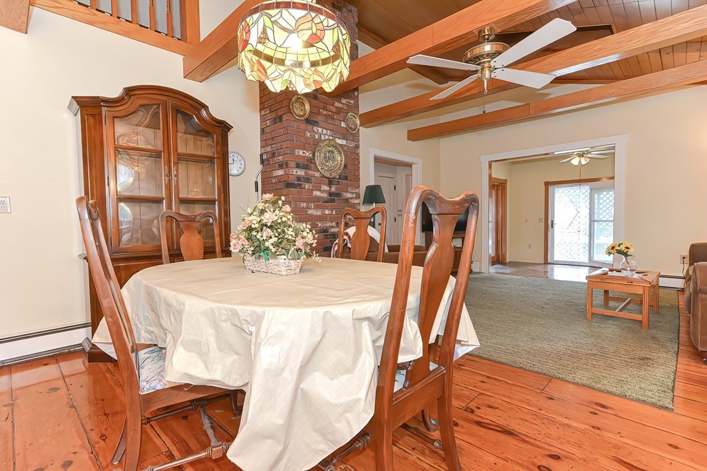 142 Middleboro Road Freetown, MA 02717 - Photo 17 of 42 a view of a dining room with furniture and chandelier