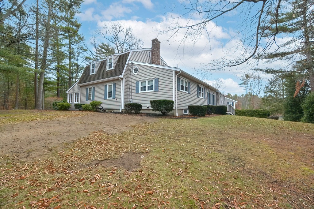 142 Middleboro Road Freetown, MA 02717 - Photo 2 of 42 a front view of a house with a yard