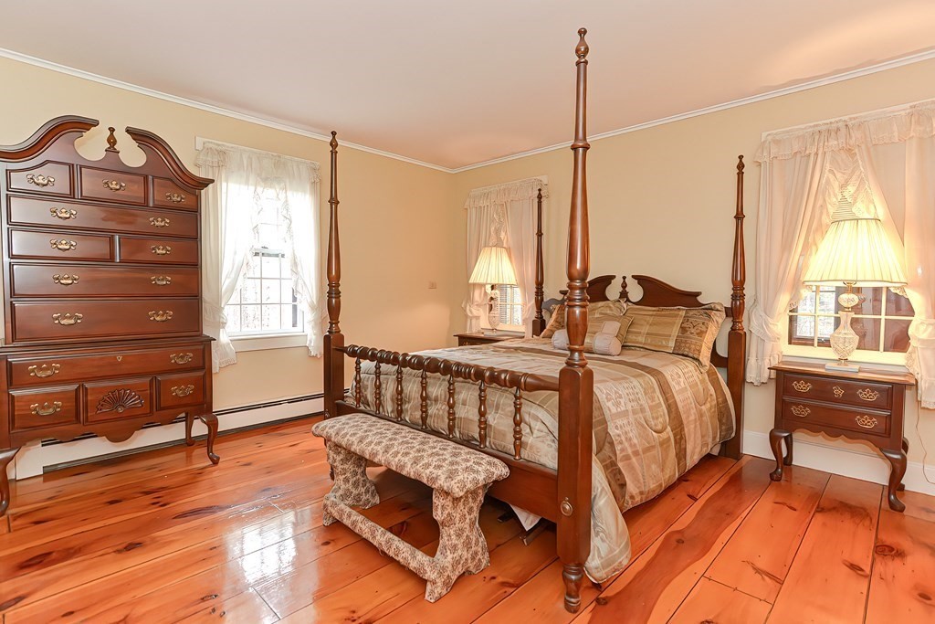 142 Middleboro Road Freetown, MA 02717 - Photo 21 of 42 a bed room with a bed and a window