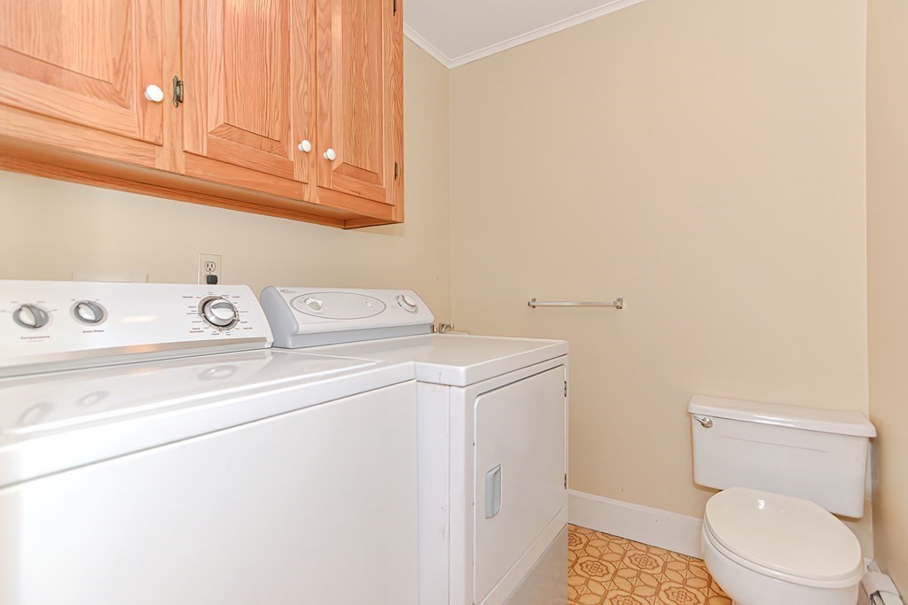 142 Middleboro Road Freetown, MA 02717 - Photo 26 of 42 a utility room with dryer and washer