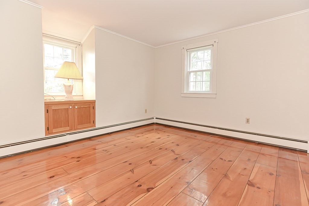 142 Middleboro Road Freetown, MA 02717 - Photo 33 of 42 wooden floor in an empty room with a window