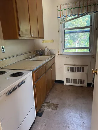 a utility room with washer and dryer