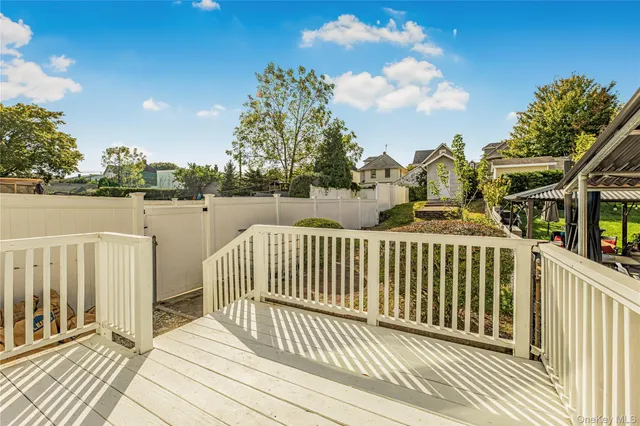 a view of a chairs on the roof deck