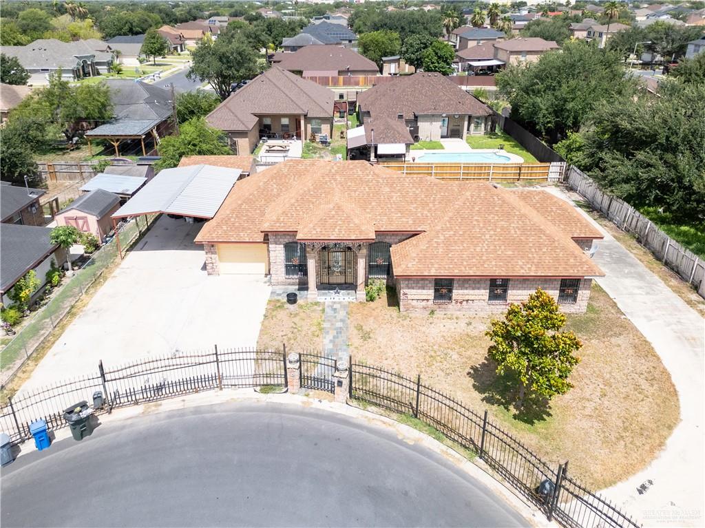3909 Tulipan Street Mission, TX 78573 - Photo 2 of 16 an aerial view of a house with a yard