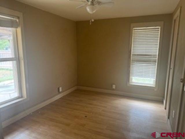 502 South Ash Street Cortez, CO 81321 - Photo 4 of 14 a view of an empty room with a window