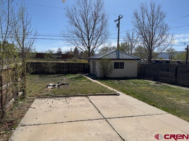 502 South Ash Street Cortez, CO 81321 - Photo 5 of 14 a view of a backyard of the house