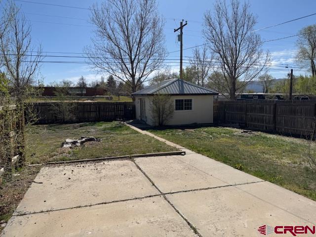 502 South Ash Street Cortez, CO 81321 - Photo 10 of 14 a view of a backyard of the house