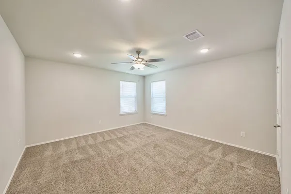 a view of a livingroom and window