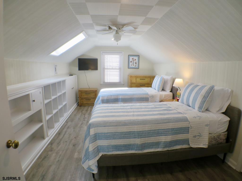 814 Wesley Road Ocean City, NJ 08226 - Photo 29 of 29 a bedroom with bed and a window