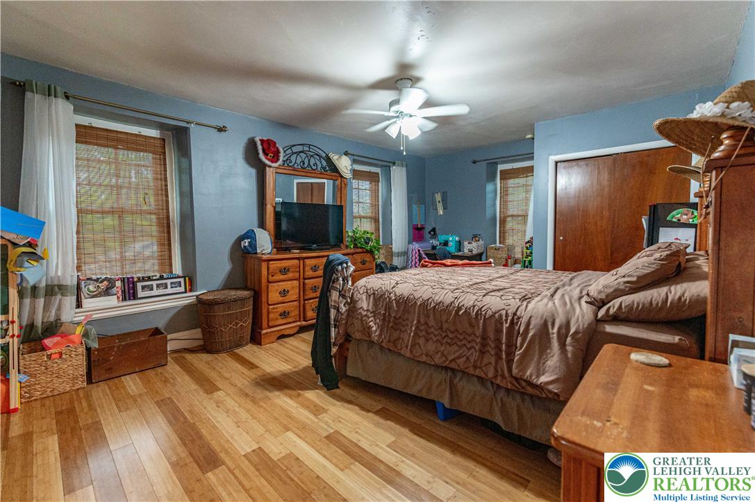 2485 Hieter Road Quakertown, PA 18951 - Photo 44 of 97 Well-lit sleeping quarters feature durable hardwood-style flooring and a wardrobe closet.
