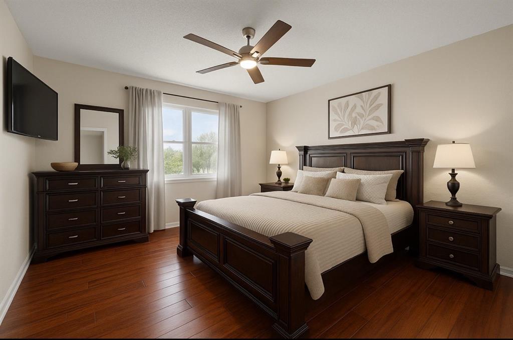 9936 Long Rifle Drive Fort Worth, TX 76108 - Photo 8 of 17 a bedroom with a bed and a flat tv screen on dresser