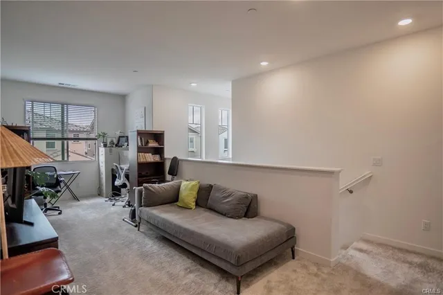 a living room with furniture and a couch