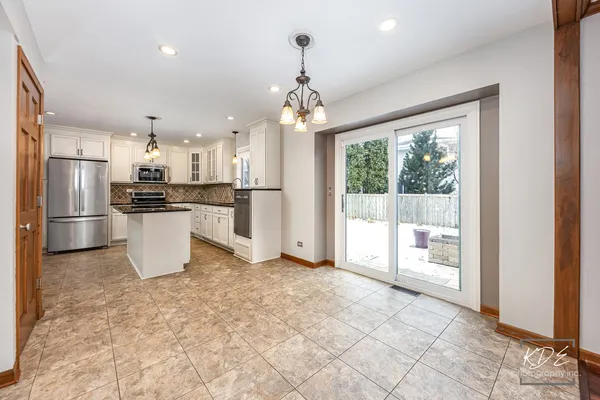 $575,000 | 515 Cimarron Drive West, Aurora, IL 60504