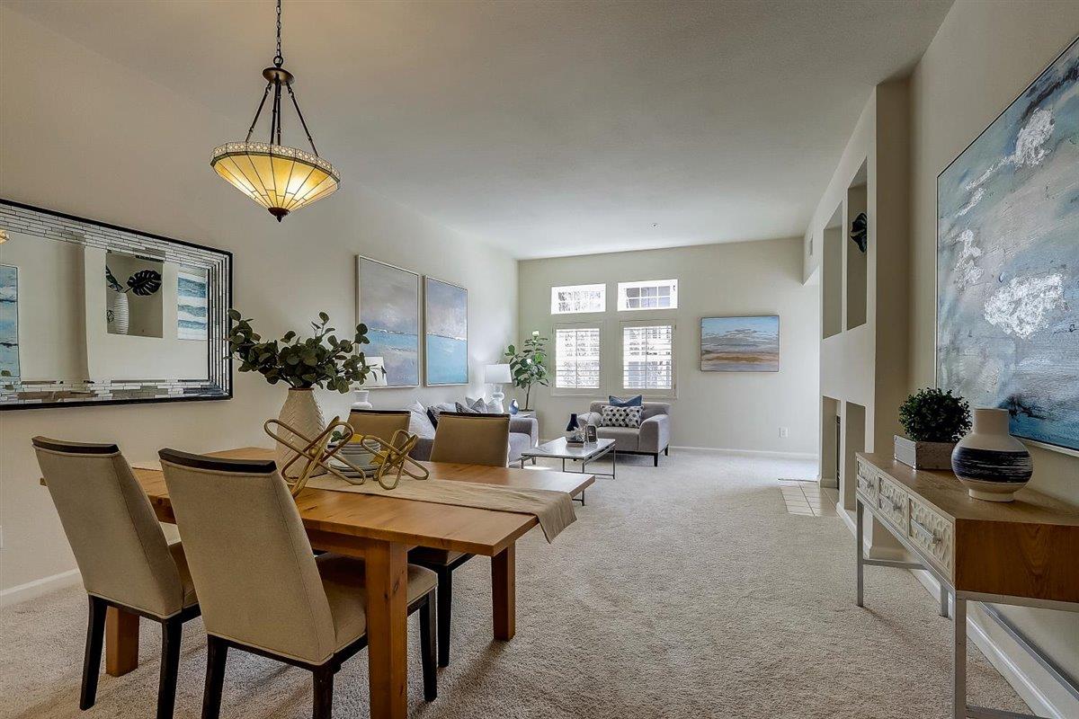 633 Swallowtail Court Brisbane, CA 94005 - Photo 11 of 42 a view of a dining room with furniture and a chandelier