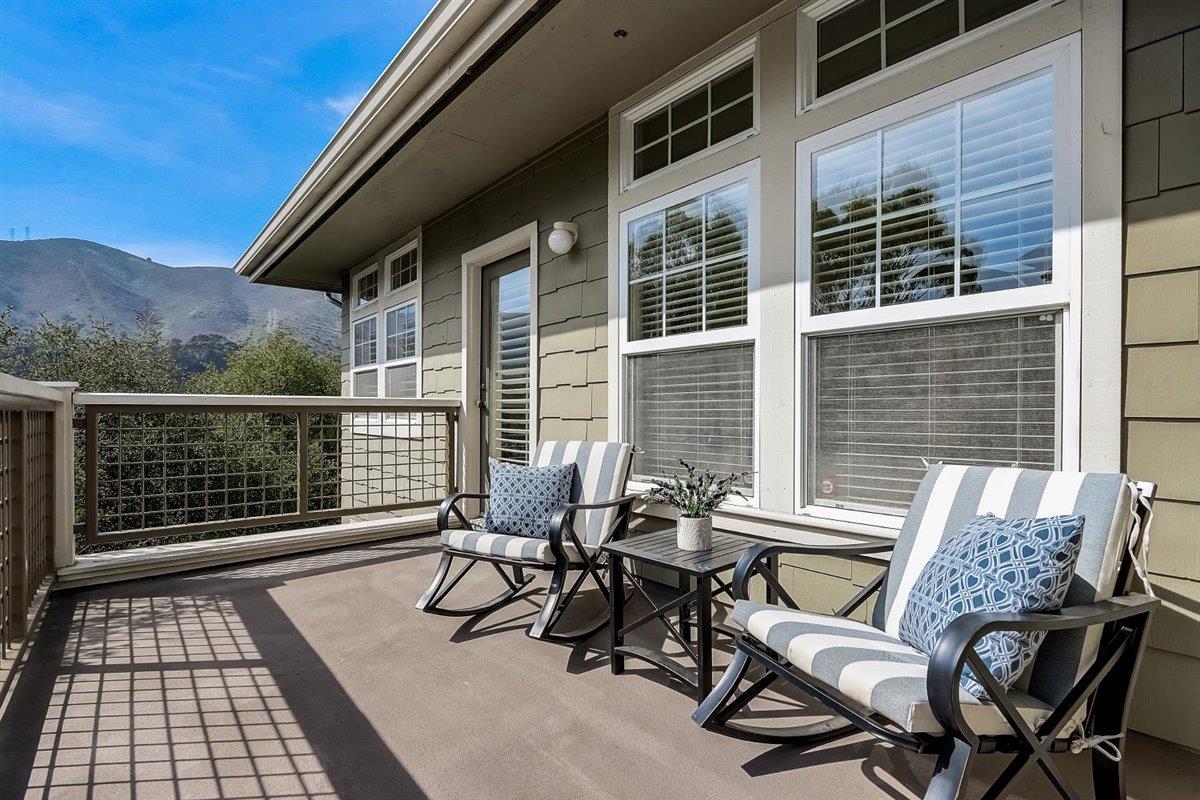 633 Swallowtail Court Brisbane, CA 94005 - Photo 28 of 42 a view of a patio with a table and chairs