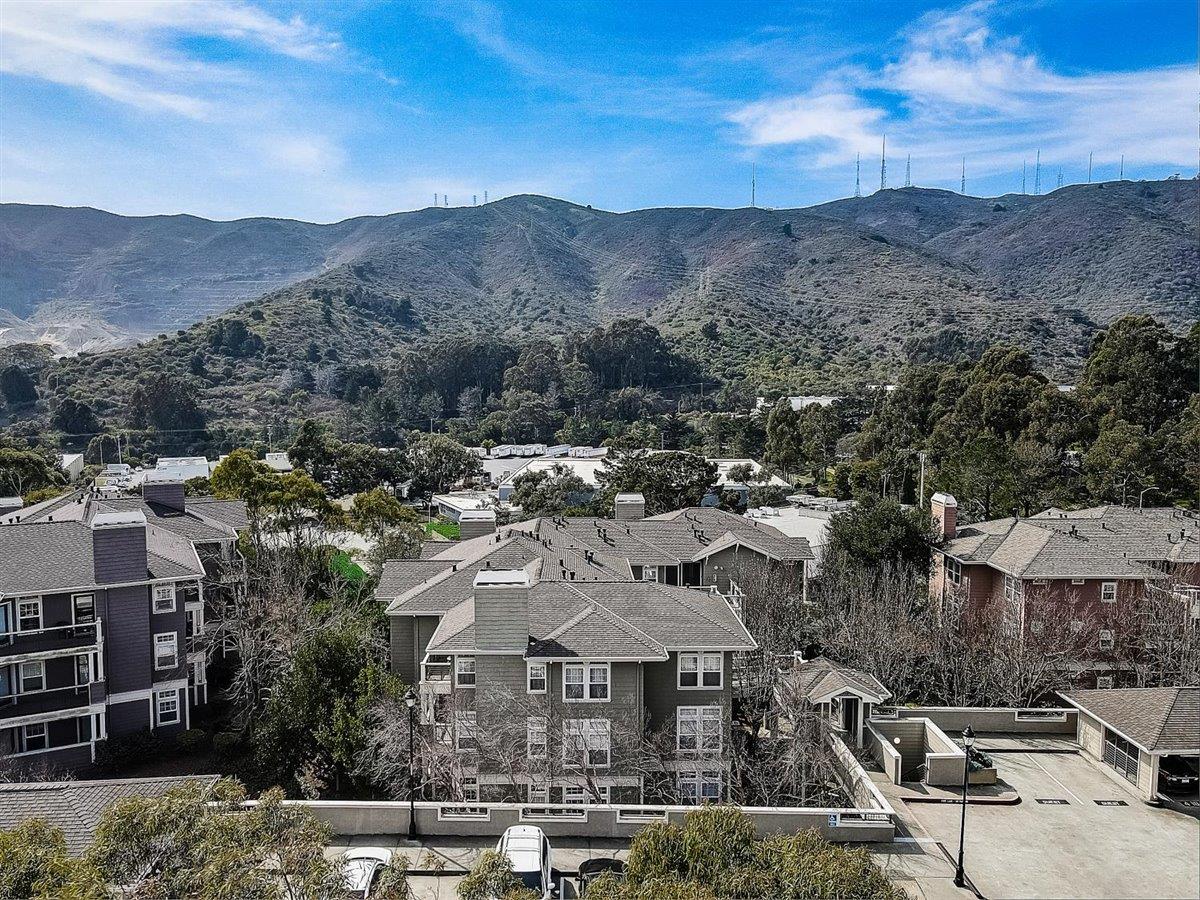 633 Swallowtail Court Brisbane, CA 94005 - Photo 34 of 42 a view of a town with mountains in the background