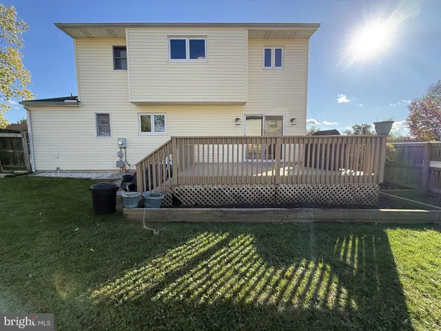 a view of a deck with a yard