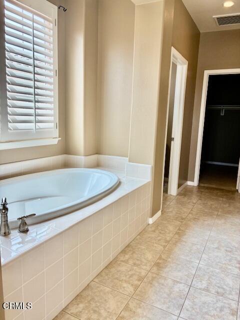 1314 Twin Tides Place Oxnard, CA 93035 - Photo 20 of 23 a bathroom with a tub and a sink