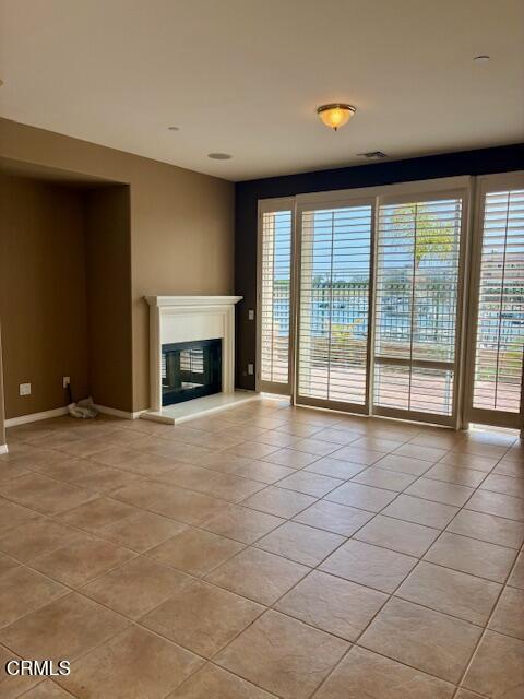 1314 Twin Tides Place Oxnard, CA 93035 - Photo 4 of 23 a view of an empty room with a fireplace