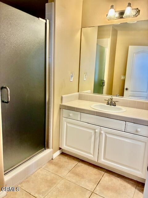 1314 Twin Tides Place Oxnard, CA 93035 - Photo 10 of 23 a bathroom with a sink and a mirror