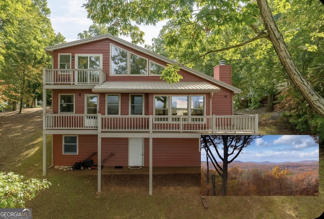 175 Oak Ledge Road Morganton, GA 30560 - Photo 1 of 50 a front view of a house with a porch