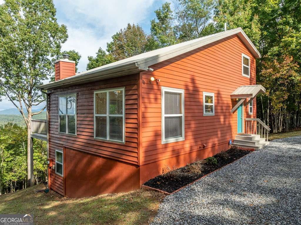 175 Oak Ledge Road Morganton, GA 30560 - Photo 14 of 50 a view of a house with a yard