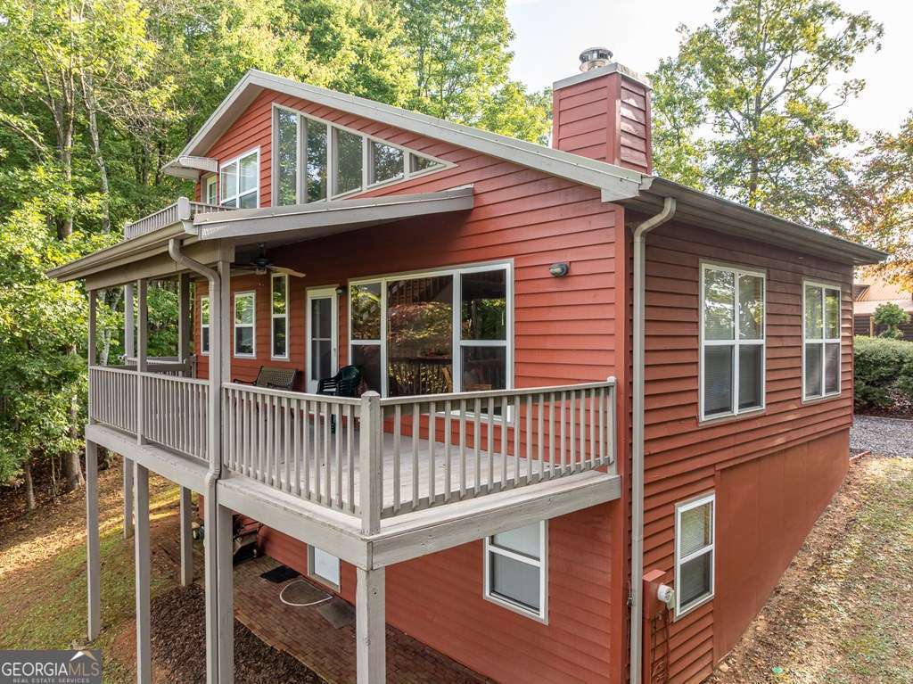 175 Oak Ledge Road Morganton, GA 30560 - Photo 15 of 50 a front view of a house with balcony