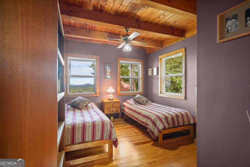 175 Oak Ledge Road Morganton, GA 30560 - Photo 25 of 50 a bedroom with two beds and a window