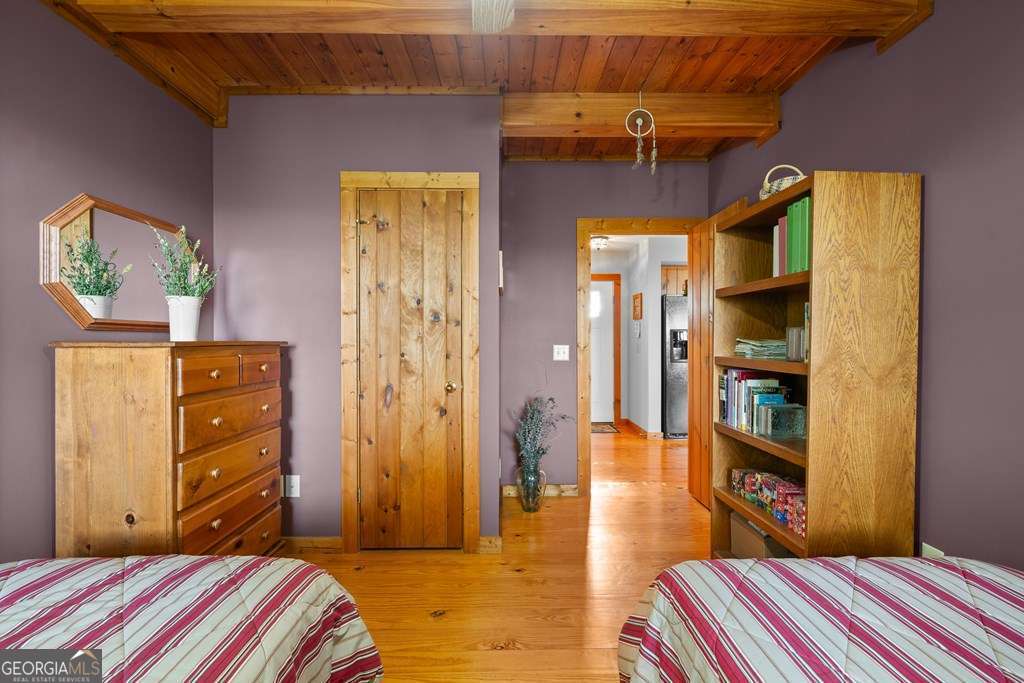 175 Oak Ledge Road Morganton, GA 30560 - Photo 26 of 50 a bedroom with a bed and a closet