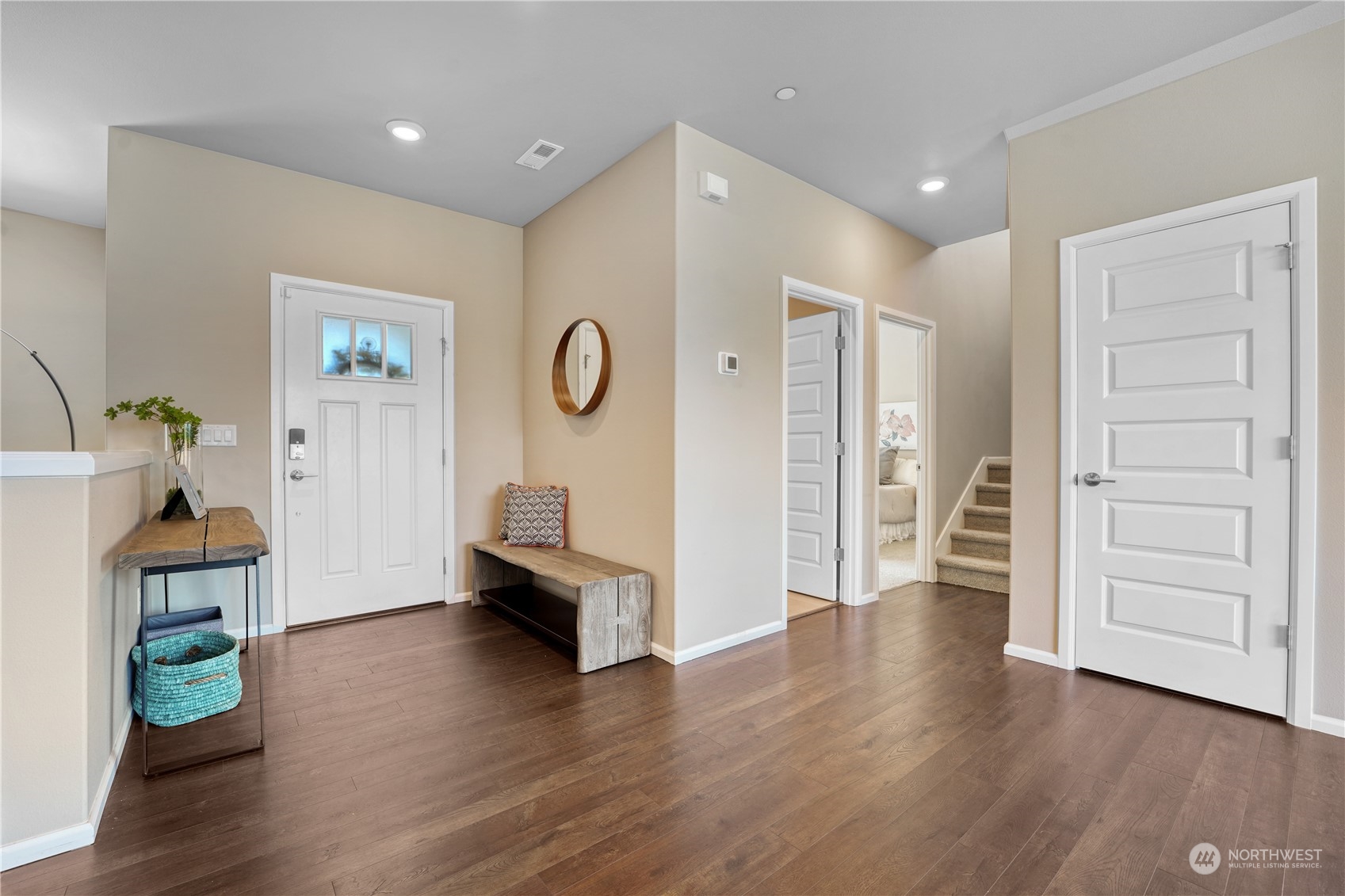 8808 Northeast 201st Place Bothell, WA 98011 - Photo 11 of 38 a living room with furniture and a wooden floor