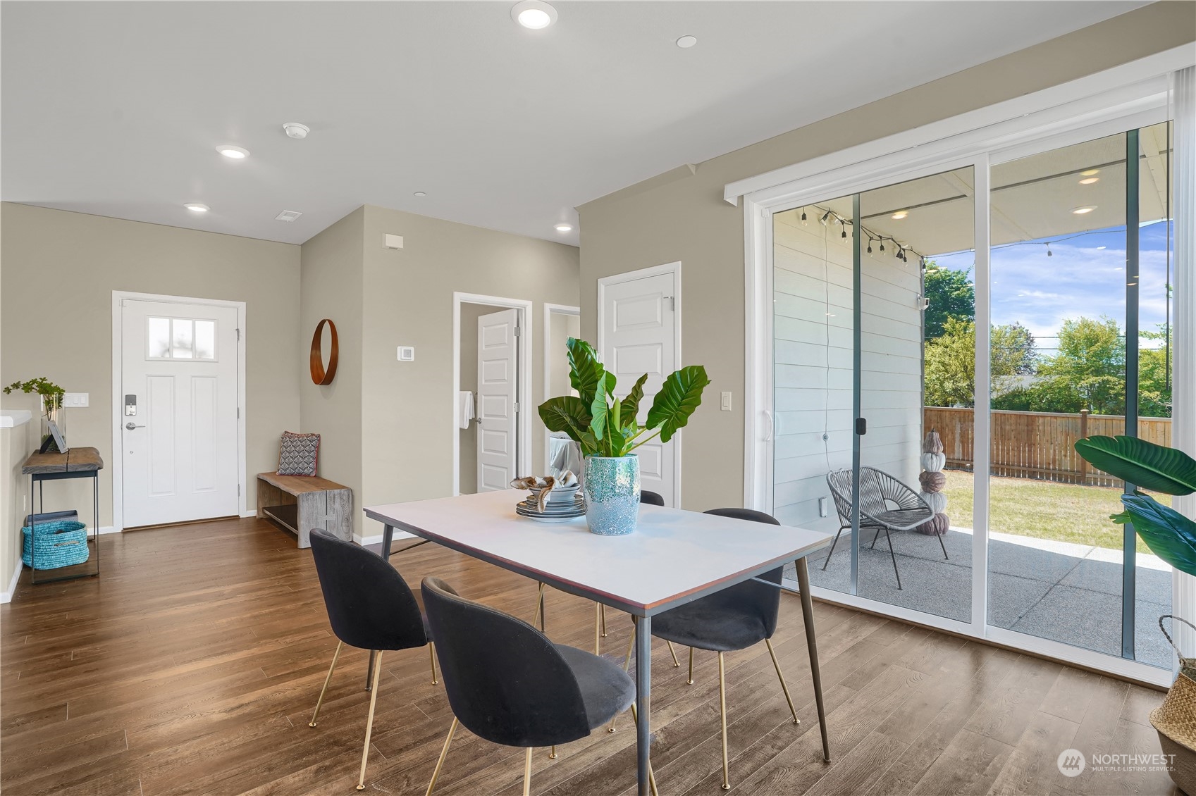 8808 Northeast 201st Place Bothell, WA 98011 - Photo 13 of 38 a dining room with furniture and wooden floor