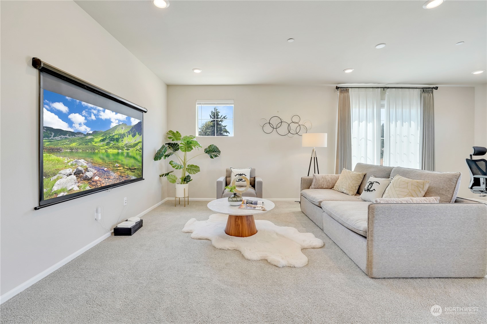 8808 Northeast 201st Place Bothell, WA 98011 - Photo 17 of 38 a living room with furniture and a flat screen tv