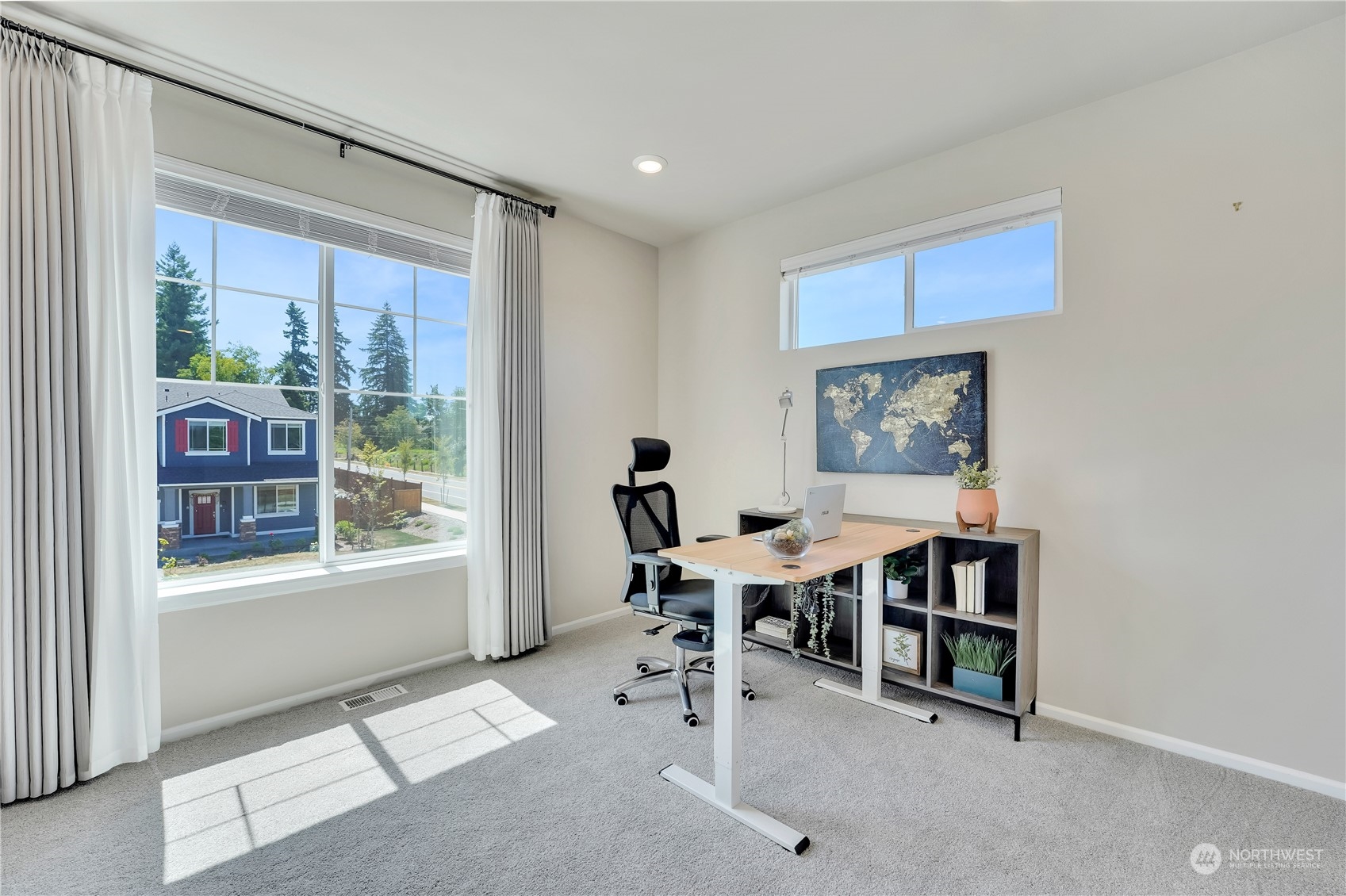 8808 Northeast 201st Place Bothell, WA 98011 - Photo 18 of 38 a work room with furniture and a window