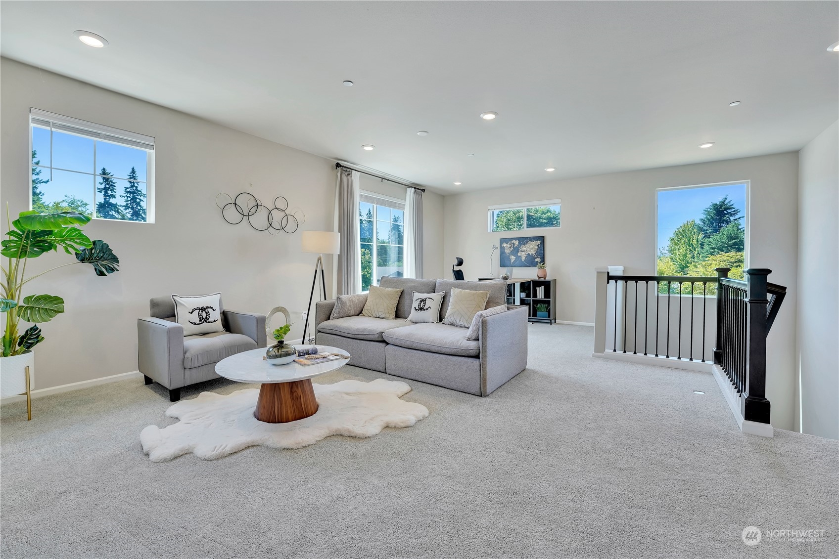 8808 Northeast 201st Place Bothell, WA 98011 - Photo 22 of 38 a living room with furniture and a potted plant